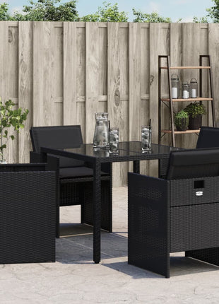 Tuinstoelen 4 st met kussens poly rattan zwart