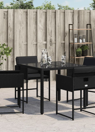 Tuinstoelen 4 st met kussens poly rattan zwart