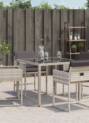Tuinstoelen 4 st met kussens poly rattan lichtgrijs