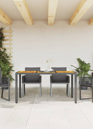 Tuinstoelen 4 st met kussens poly rattan zwart